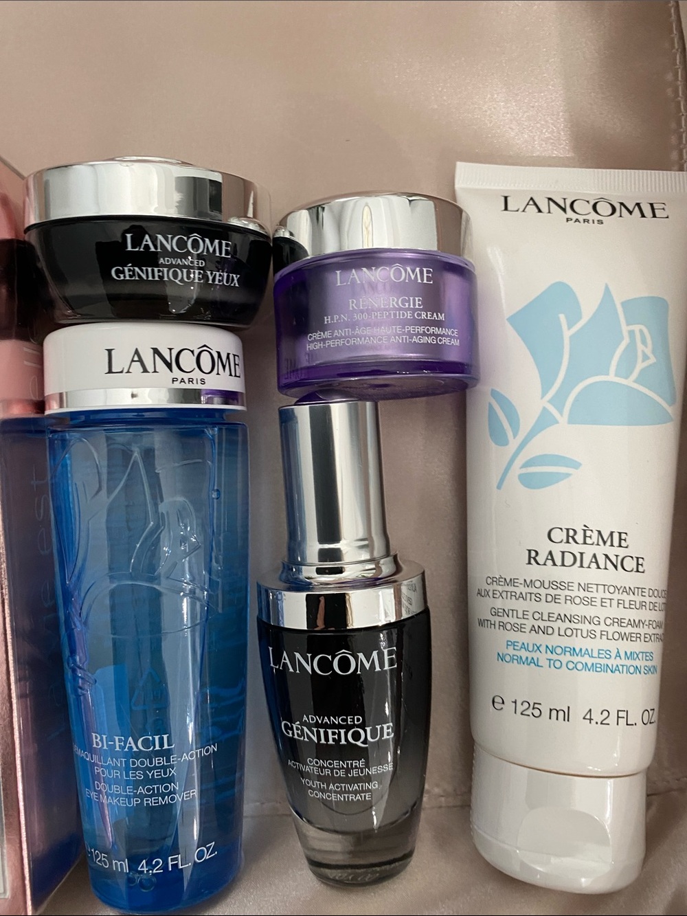 Lancome skincare and fragrance collection in pink, blue, purple - Picture 3 of 6
